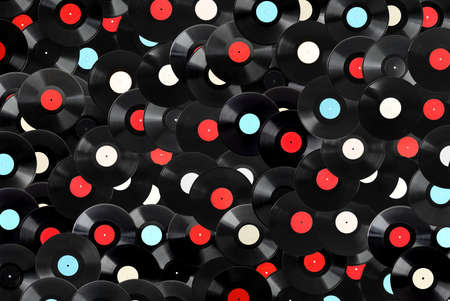 Black vintage vinyl records as background, top viewの写真素材
