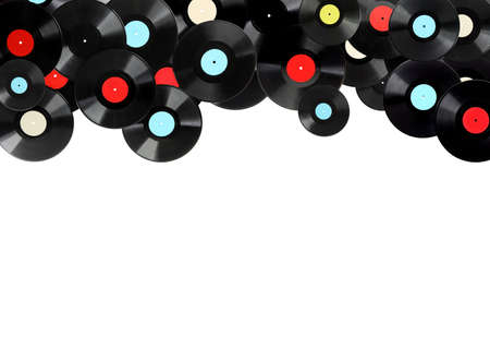 Black vintage vinyl records on white backgroundの写真素材