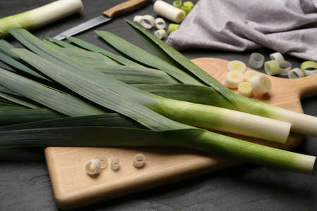Fresh raw leeks on black table, closeupの写真素材