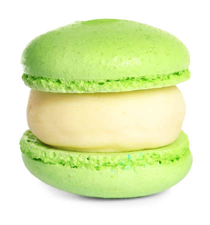 Green macaron on white background. Delicious dessertの写真素材