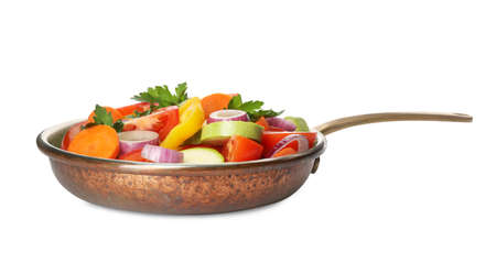 Mix of vegetables in frying pan isolated on whiteの写真素材