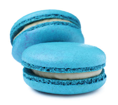 Light blue macarons on white background. Delicious dessertの写真素材