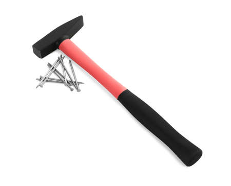 Hammer and metal nails on white background