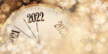 Clock counting last moments to New 2022 Year and beautiful fireworks on background, banner design
