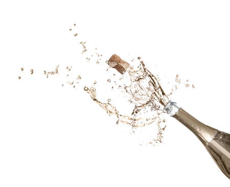 Sparkling wine splashing out of bottle on white background