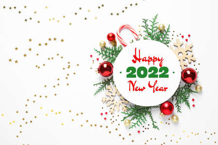 Beautiful decor and card with text Happy New 2022 Year on white background