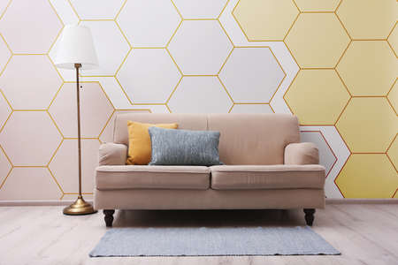Textured wall with honeycomb pattern in stylish living roomの写真素材