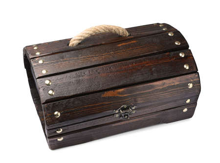 Closed old wooden treasure chest isolated on white