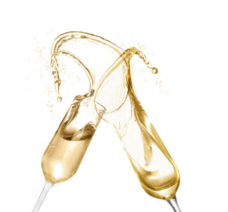 Clinking glasses of sparkling wine with splash on white backgroundの写真素材