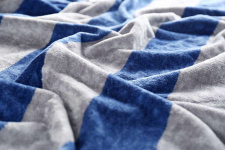 Crumpled striped beach towel as background, closeup viewの写真素材