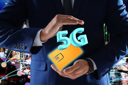 Man demonstrating 5G SIM card model and cityscape with connection lines on background, closeupの写真素材