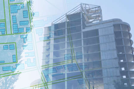 Double exposure of cadastral map and unfinished building