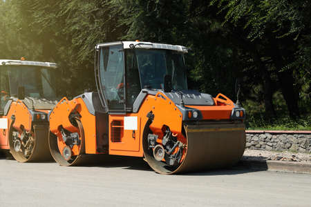 Modern rollers on city street. Road repair service