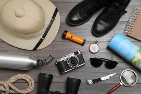 Flat lay composition with safari accessories on wooden backgroundの写真素材
