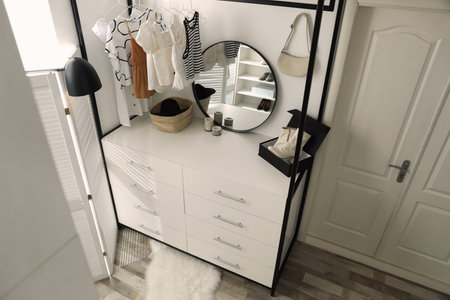 Closet interior with storage rack for clothes and accessories