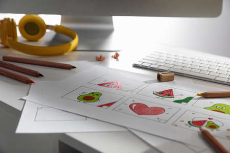 Storyboard with cartoon sketches at workplace. Pre-production processの写真素材