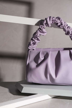 Stylish women's bag on light gray tableの写真素材