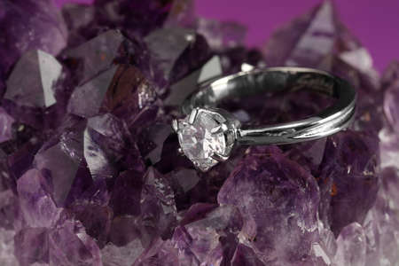 Beautiful luxury engagement ring with gemstone on amethyst, closeupの写真素材