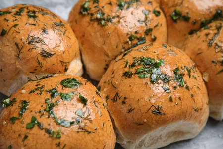 Traditional pampushka buns with garlic and herbs, closeupの写真素材