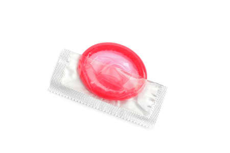 Torn condom package isolated on white, top view. Safe sexの写真素材