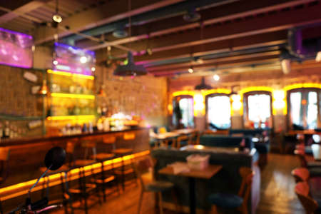 Bright blurred view of modern bar interiorの写真素材