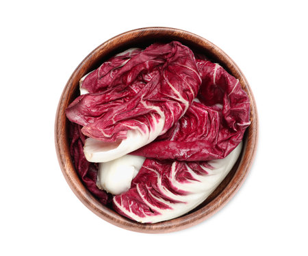 Leaves of ripe radicchio in bowl on white background, top viewの写真素材