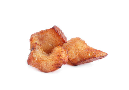 Tasty fried cracklings on white background. Cooked pork lardの写真素材