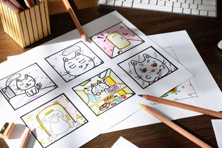 Storyboard with cartoon sketches at workplace. Pre-production processの写真素材
