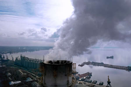 Polluting air with smoke, aerial view of industrial factory. CO2 emissions