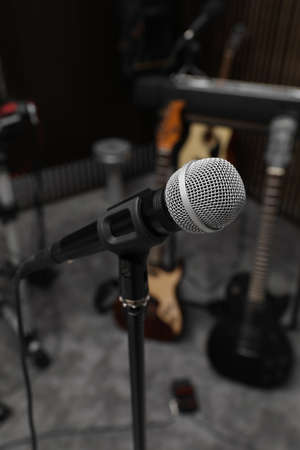 Modern microphone at recording studio. Music band practiceの写真素材