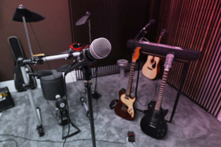 Modern microphone at recording studio. Music band practiceの写真素材