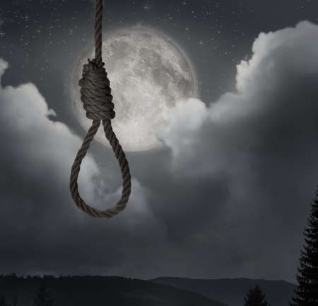 Rope noose with knot outdoors on full moon nightの写真素材