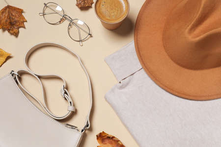 Flat lay composition with stylish hat on beige backgroundの写真素材