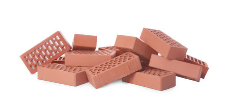Pile of red bricks on white background. Building materialの写真素材