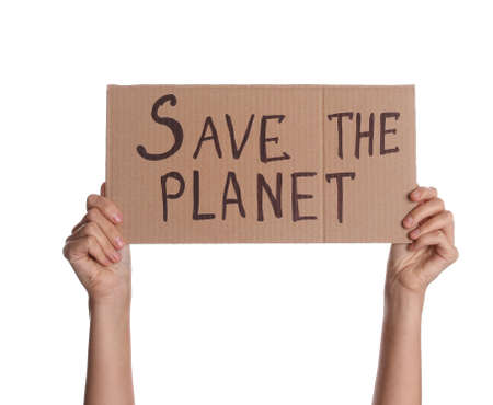 Protestor holding placard with text Save The Planet on white background, closeup. Climate strikeの写真素材
