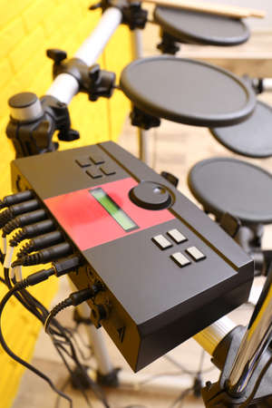 Modern electronic drum kit indoors, focus on module. Musical instrumentの写真素材