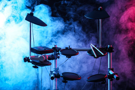 Modern electronic drum kit and smoke on dark background, color toned. Musical instrumentの写真素材