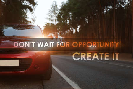 Don't Wait For Opportunity Create It. Inspirational quote motivating to take first step, to be active. Text against luxury car parked near forestの写真素材