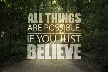 All Things Are Possible, If You Just Believe. Inspirational quote saying about power of faith. Text against beautiful forest and pathの写真素材