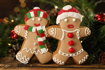 Delicious homemade Christmas cookies and festive decor on wooden tableの写真素材