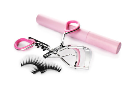 False eyelashes, curler and mascara on white backgroundの写真素材