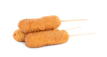 Delicious deep fried corn dogs isolated on whiteの写真素材