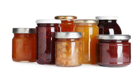 Jars with different jams on white backgroundの写真素材