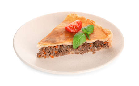 Piece of delicious pie with minced meat, tomato and basil isolated on whiteの写真素材