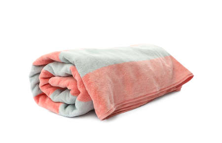 Rolled striped beach towel isolated on white