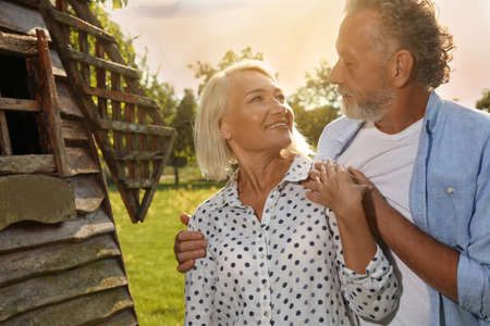 Lovely mature couple spending time together in park