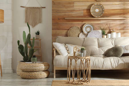 Living room interior with stylish decor and comfortable sofa