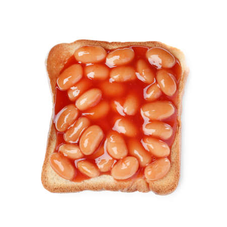 Delicious bread slice with baked beans isolated on white, top viewの写真素材