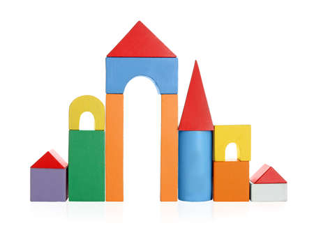 Building made of colorful wooden blocks on white backgroundの写真素材
