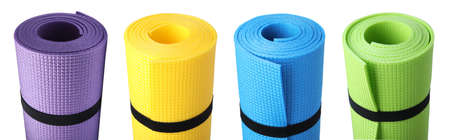 Set with colorful rolled camping mats on white background. Banner designの写真素材